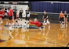 Dakota Soltis dives for a dig against Browerville/Eagle Valley. 
