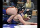 Dalton Butler had one of the Wolves’ three pinfall victories to fuel their comeback win against Osakis.