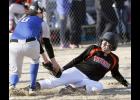 Browerville/Eagle Valley senior Kenzi Riedel slid into home plate just before LPGE sophomore Riley Steinmetz placed the tag on her.