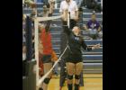 Upsala’s Kiley Smieja (L) was able to get a block on an attack by LPGE setter Kayla Bense (R) during last Tuesday’s match.