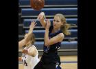 Sophomore Emma Liebsch kicked a pass out to a teammate during Thursday’s game with WDC.