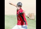 Junior Eric Hinnenkamp fired a pitch during last summer’s Babe Ruth playoffs. He found success on the mound last spring and summer.