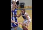 LPGE junior Rachel Middendorf (R) looked for some driving room while being defended by Swanville’s Madison Beseman (L).