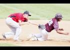 Hudson Pung placed the tag on a Sauk Centre runner who was caught between first and second.
