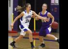 Raelyn Miller (L) steals a pass during the Thunder’s game against Melrose. The senior was named to the All-Conference team and was named LPGE’s Defensive MVP.