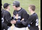 Riley Tabatt (M) celebrated with teammates Sam Olson (L) and Eric Hinnenkamp (R) after his game-winning hit on Friday. The junior first baseman had a good week at the plate, collecting four hits in two games.