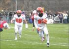 Miguel Maloney, 22, made his way up field in the Tigers’ semifinal game against Upsala/Swanville Area.