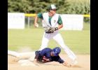 Shortstop Duane Miller set to throw to first after recording the out at second base during Sunday’s game against Carlos.