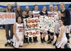 The Tiger girls celebrated last Friday as senior Quinn Kircher surpassed the 2,000 career point milestone.