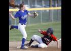 A high throw to third base allowed B/EV’s Crystal Pearson to slide in safely before Swanville’s Ellie Koetter could place the tag on her.