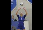 Swanville’s Haileigh Sales (L) went for a set during the third set. 