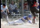 Swanville sophomore Becca Taylor slid into home plate safely for one of the team’s eight runs in their loss to West Central Area.