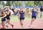 Juniors Abby Ecker (L) and Elle Olson (R) are members of the first place 4x200 relay team.