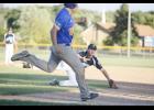 Starting pitcher Eric Hinnenkamp helped himself out by making a nice diving play to get the force out at first. He had a huge game on the mound, striking out 20 batters in nine innings.