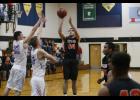 Bryce Irsfeld pulled up for a jumper during the Tigers’ Prairie Conference opener.