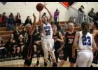 Taylor Kingston (R) went up for a shot over B/EV’s Quinn Kircher (L). The Thunder guard put up 28 points in the win.