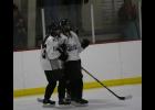 The Ecker sisters, Abby (R) and Ally (L) celebrate after Abby’s first period goal gave the Blue Devils an early lead last Tuesday.