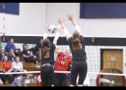 Josee Hartshorn watches her kill attempt.