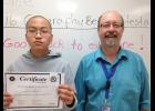 Geo Bee winner Simon Lian and Bee Coordinator, Ronn Mindeman.