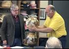Mark Moran (L) appraised Pete Haugen’s vase, which was the highest valued item, at his 2017 event in Long Prairie. Moran will be back in town and registrations are still open for items to appraise.
