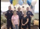 Patty Weibye and Crickett at Upsa Daisy Floral in Long Prairie recently presented some balloons to Sgt. Duane Breiter, Chief Kevin Langer and Officer Rodger Lowe from the Long Prairie Police Department.
