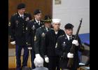 The Honor Guard members exit the stage after posting the colors.